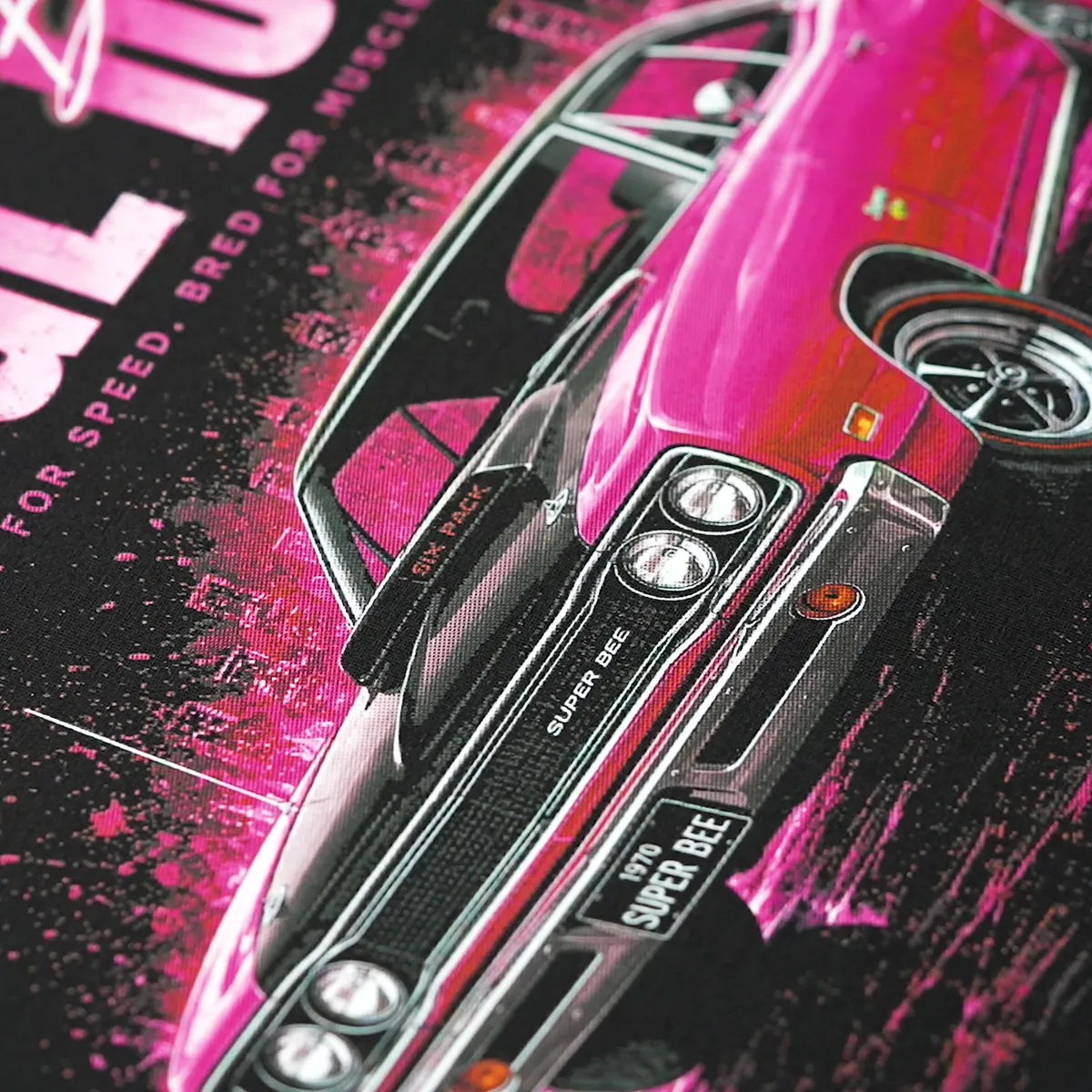 Finished pink car print on a black T-shirt after pressing