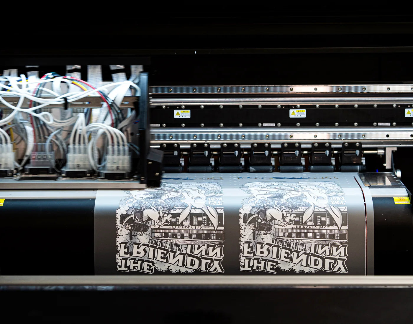 Wide-format DTF printer producing a gang sheet